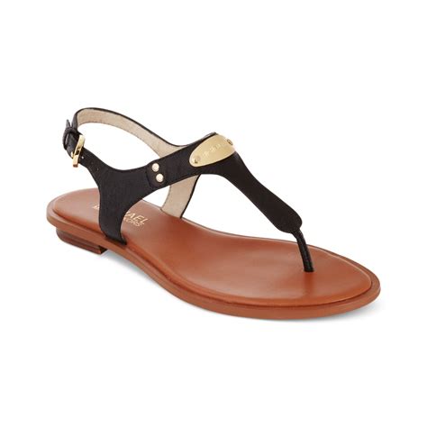 mk plate flat thong sandals.